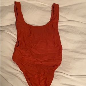 Red low scoop one piece